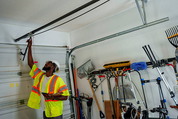 Professional Garage Door Installation technician working in East Pepperell, MA